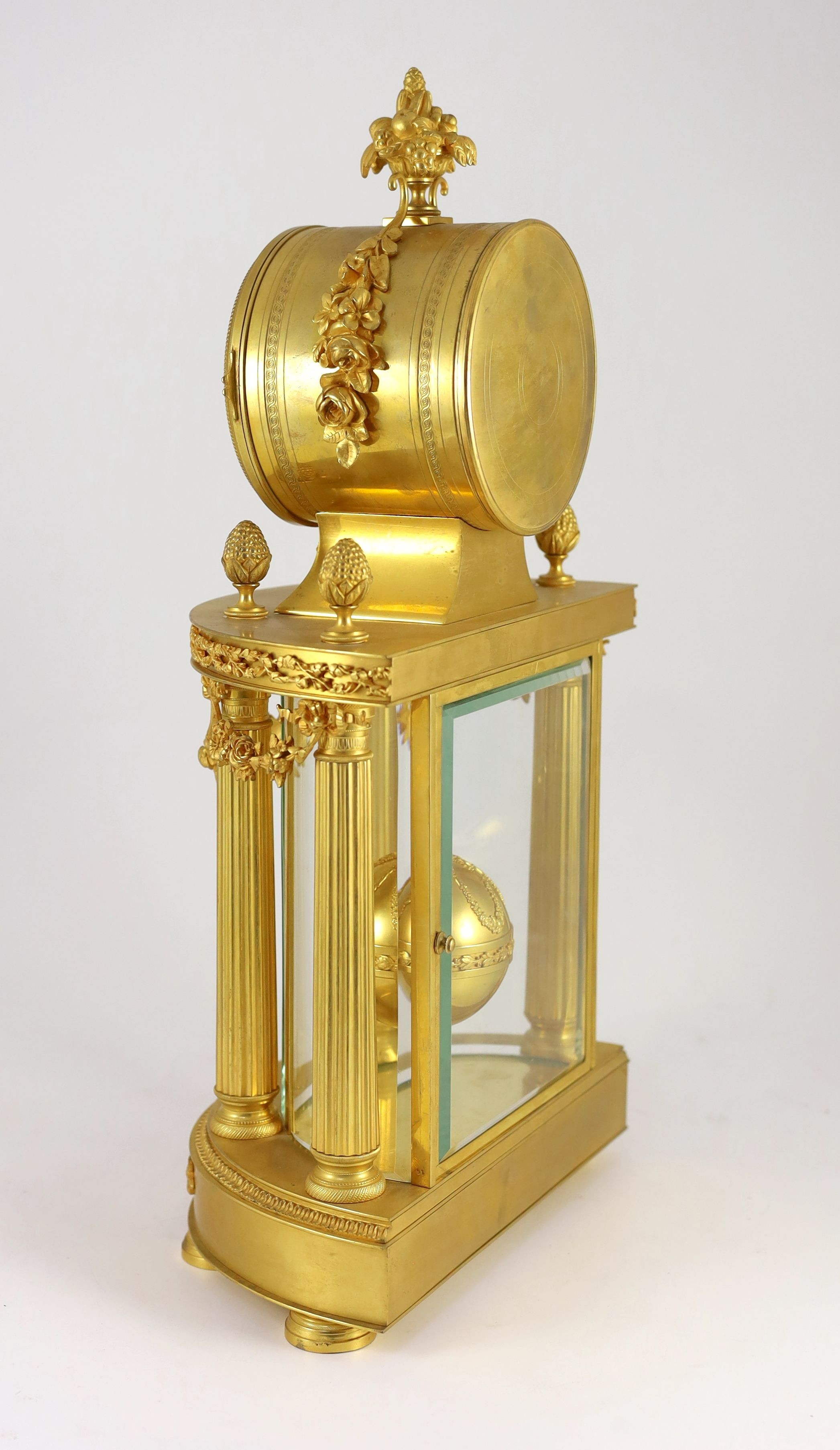 An early 20th century French ormolu 400 day mantel clock, width 26cm, depth 15cm, height 52cm